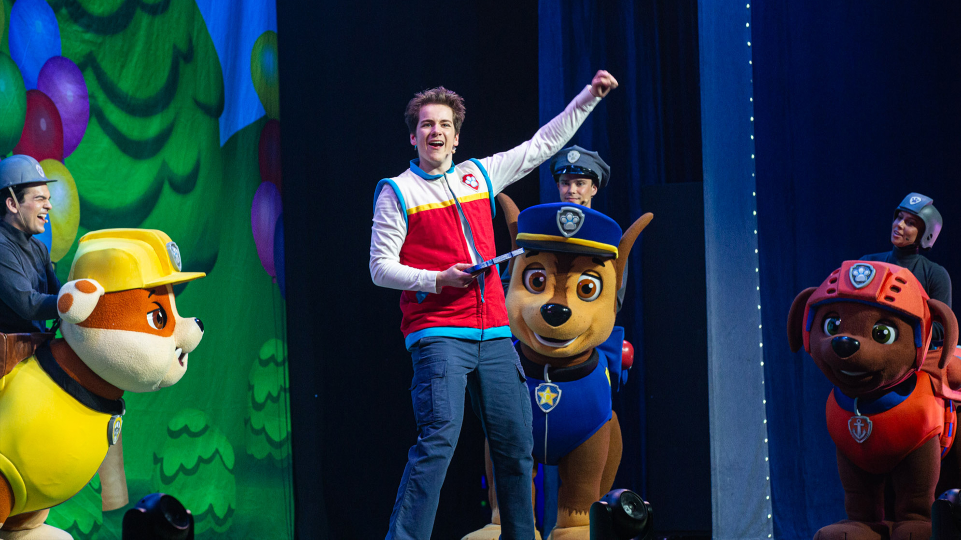 PAW Patrol characters are featured on stage.