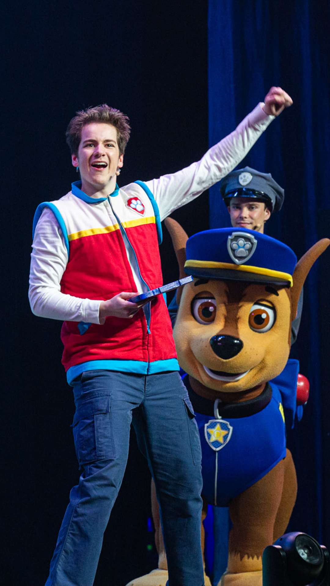 PAW Patrol characters are featured on stage.